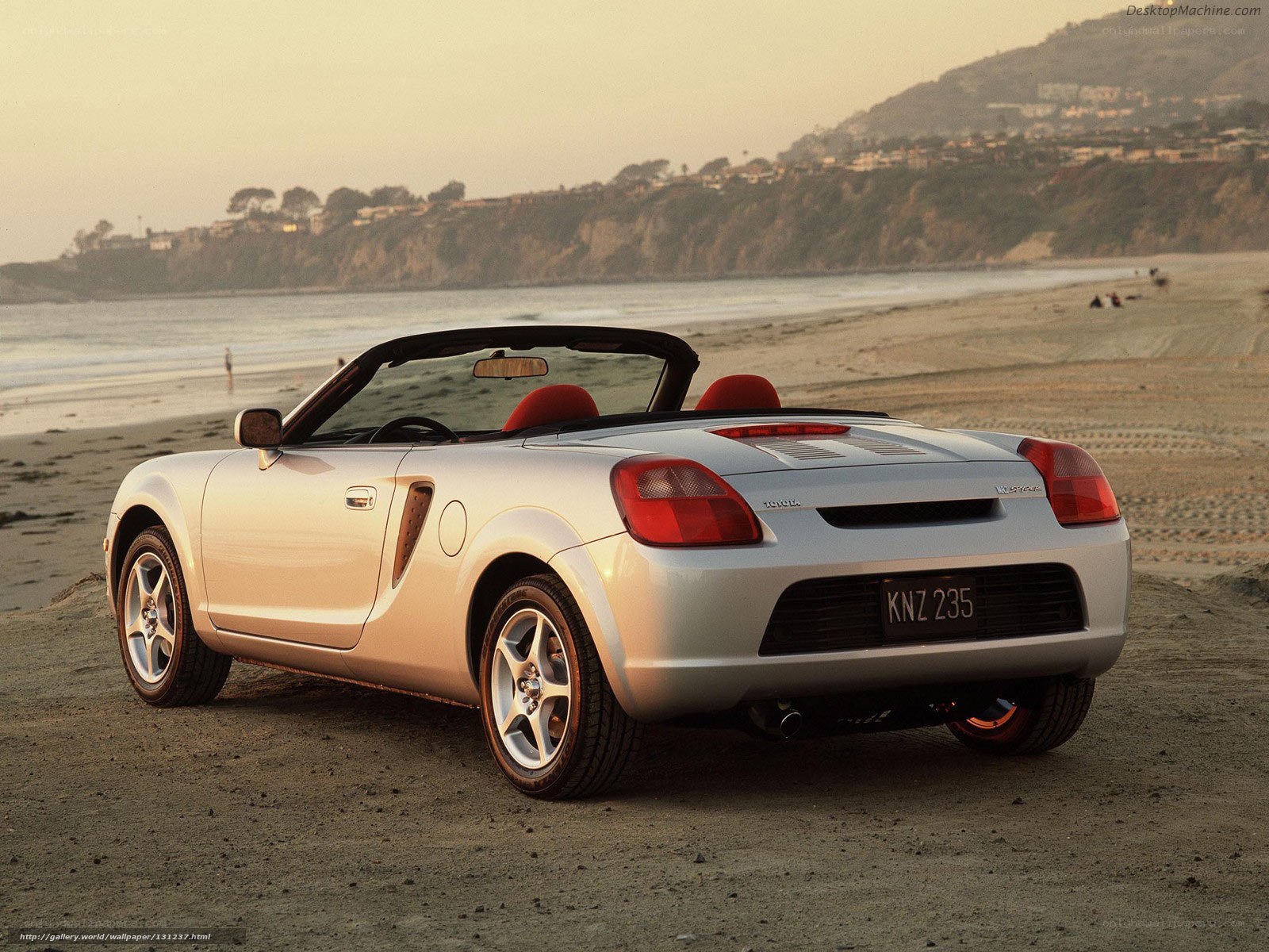 Silver Toyota MR2 on beach