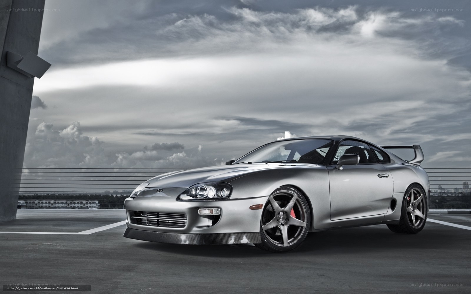 Silver Toyota Supra on rooftop