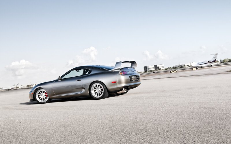 Silver Toyota Supra on tarmac
