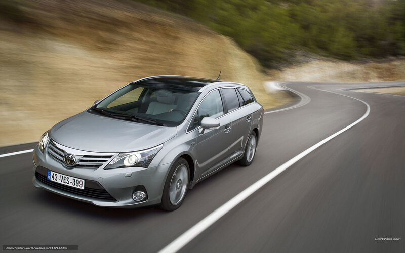 silver toyota wagon on winding road