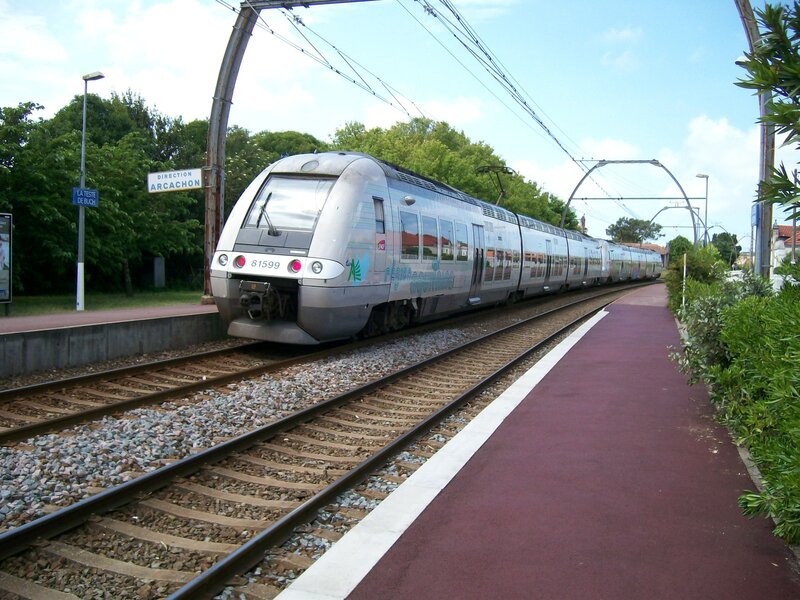 Silver Train at Station — Calm, Afternoon