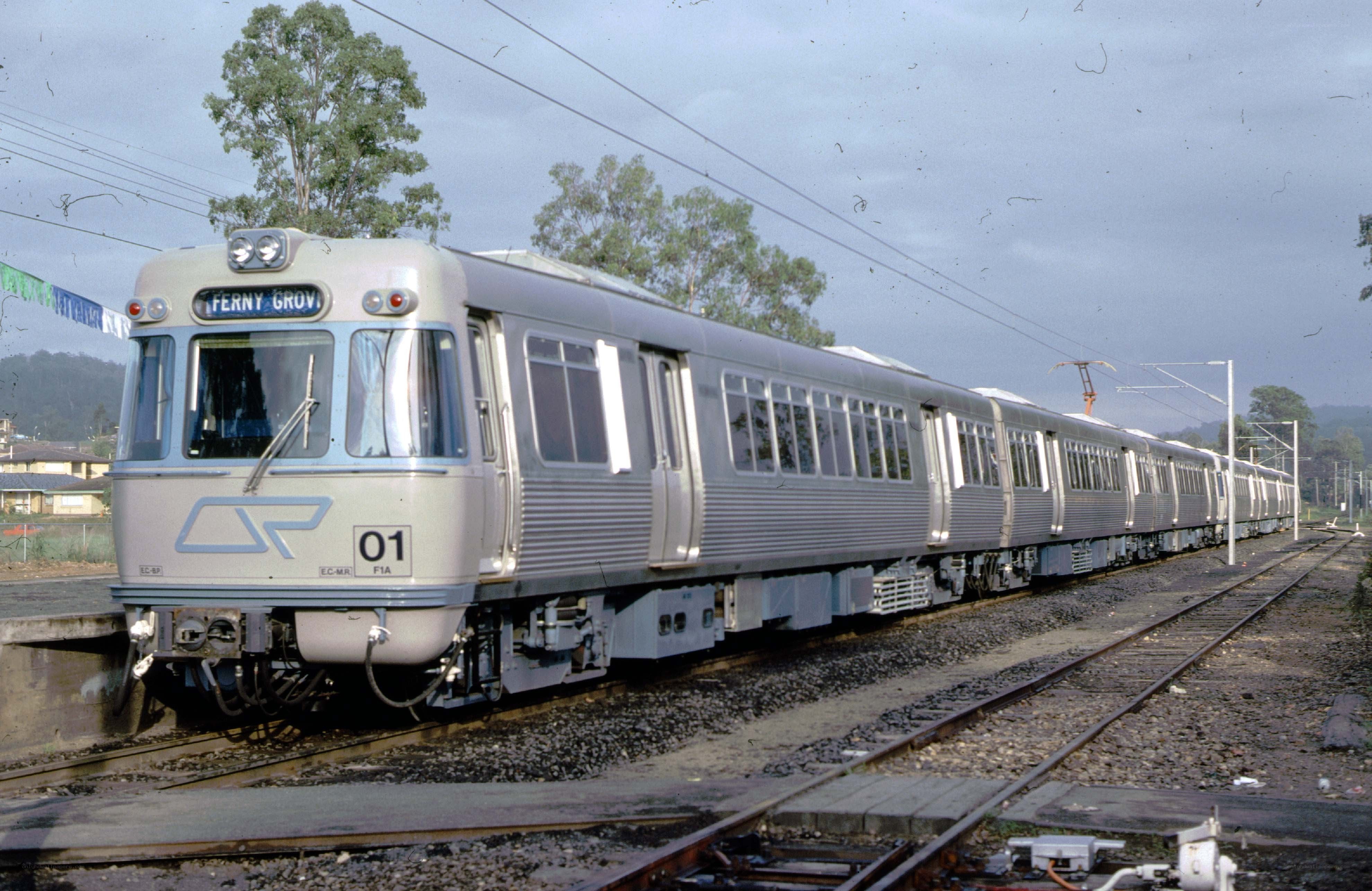 Silver train at station