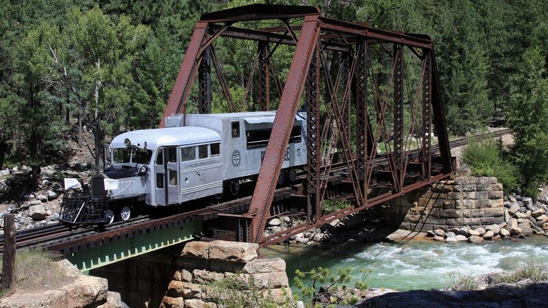 Silver Train on Bridge