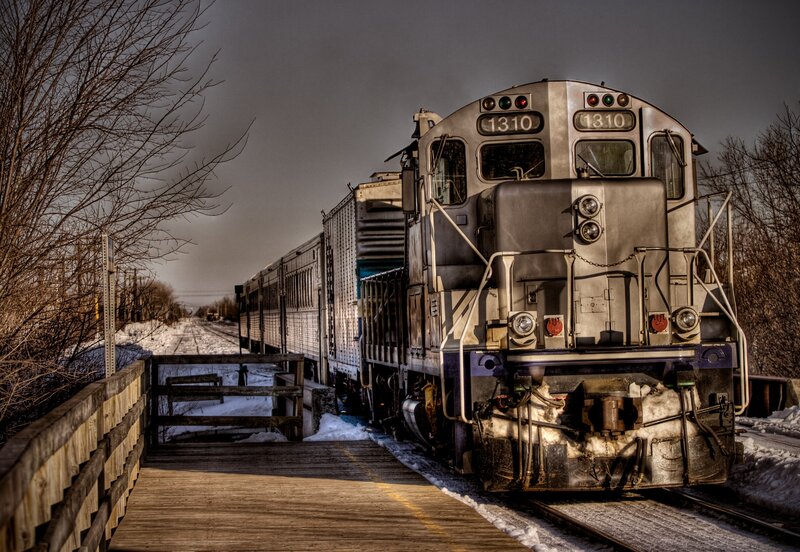 Silver Train on Tracks — Gray