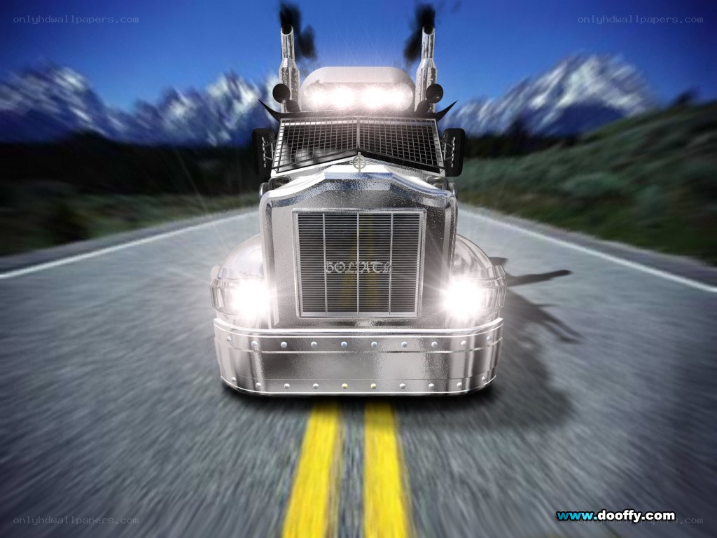 silver truck on mountain road