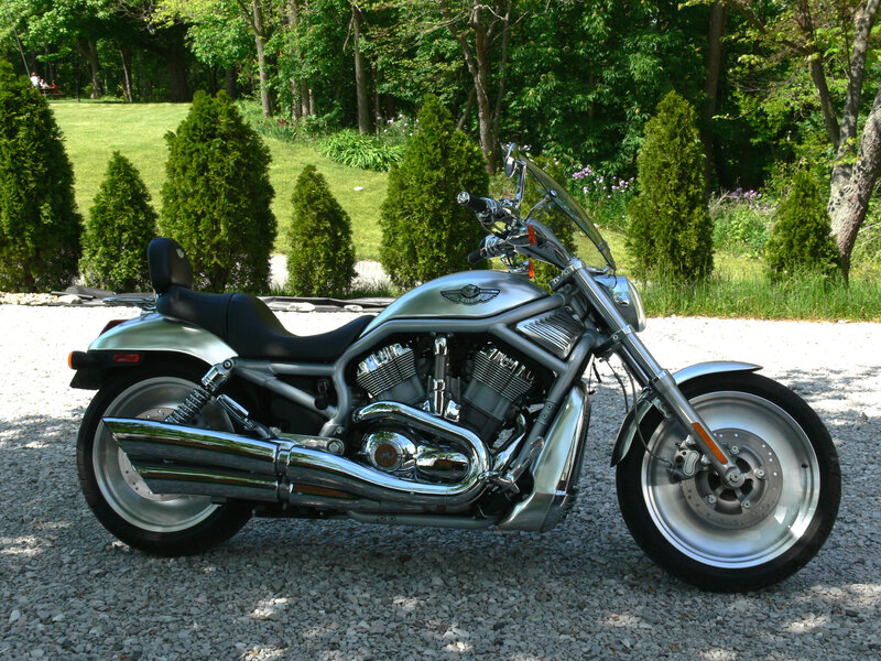 Silver V-Rod motorcycle on gravel