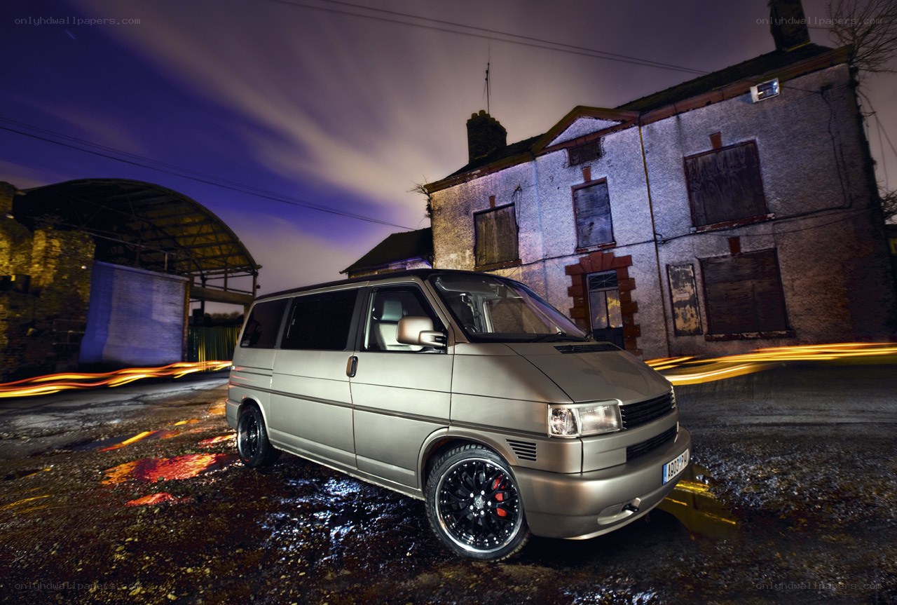 Silver van at night in urban setting