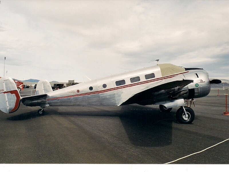 Silver Vintage Airplane — Gray, Calm, Afternoon