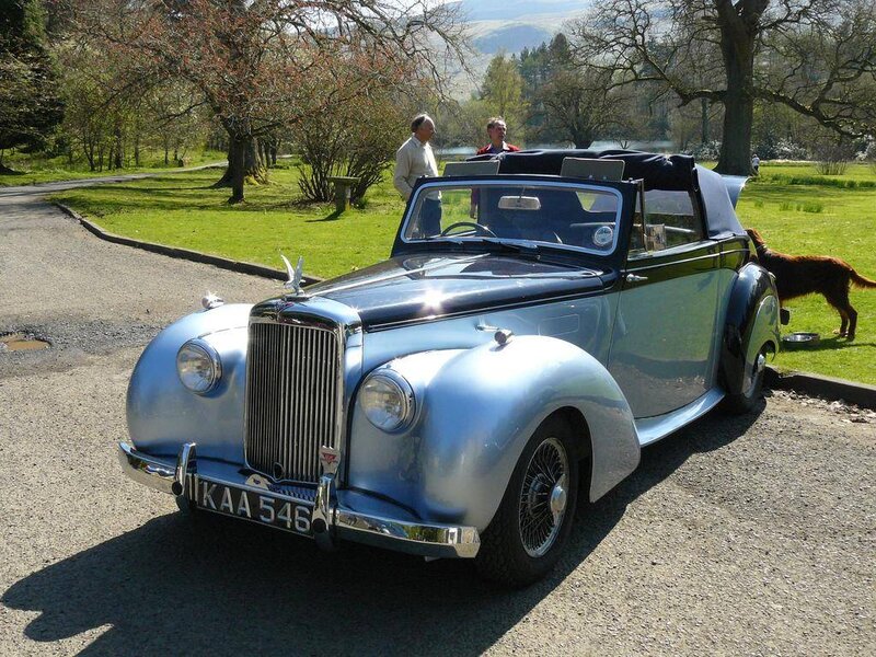 Silver Vintage Convertible — Serene, Afternoon, Photograph, People