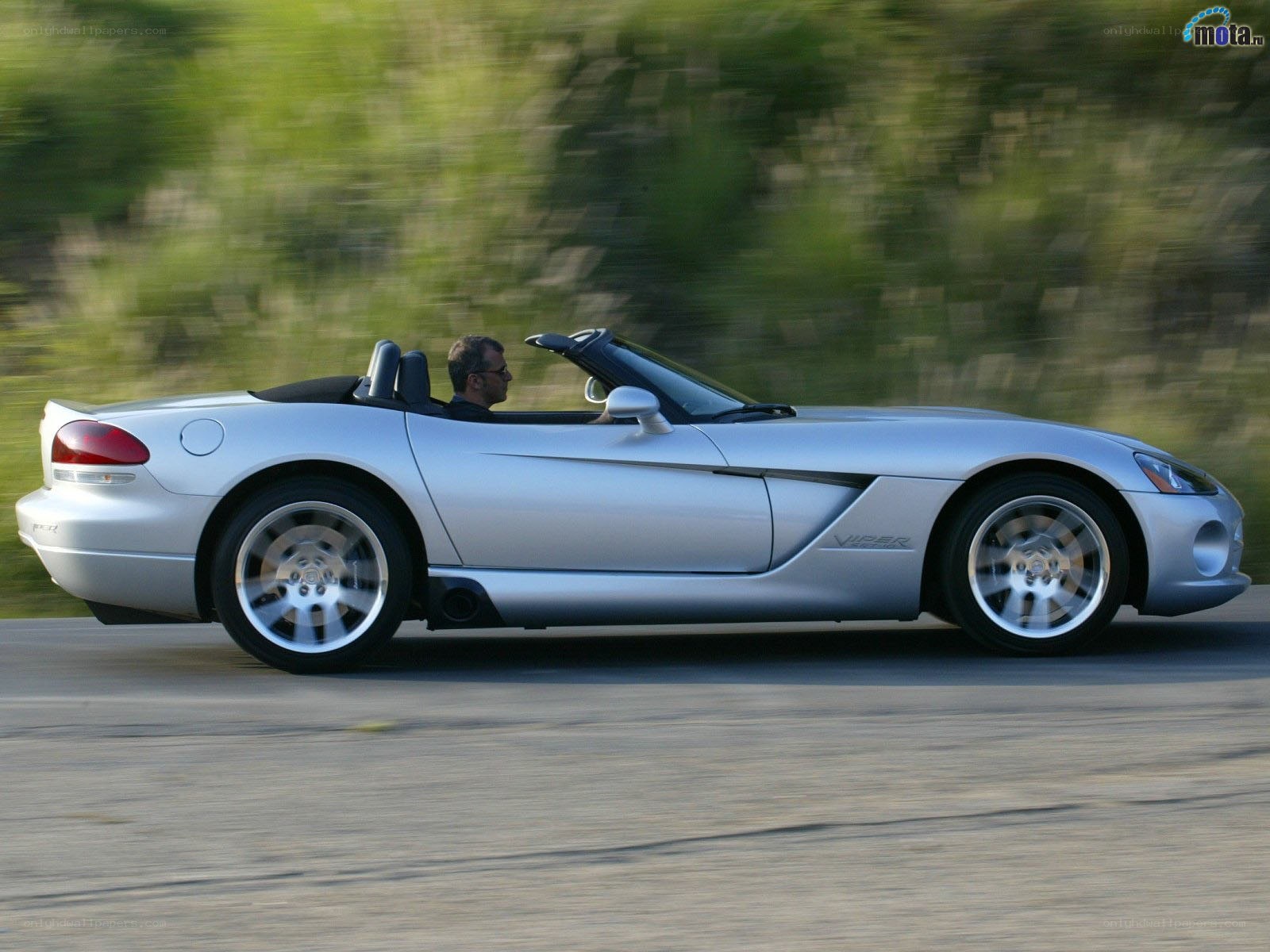 Silver Viper convertible in motion