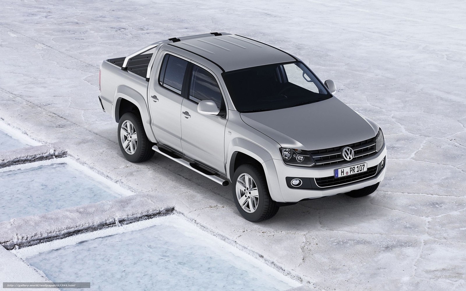 silver volkswagen amarok on ice