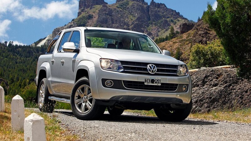 Silver Volkswagen Amarok on mountain road