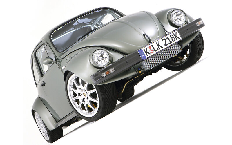 Silver Volkswagen Beetle with custom wheels