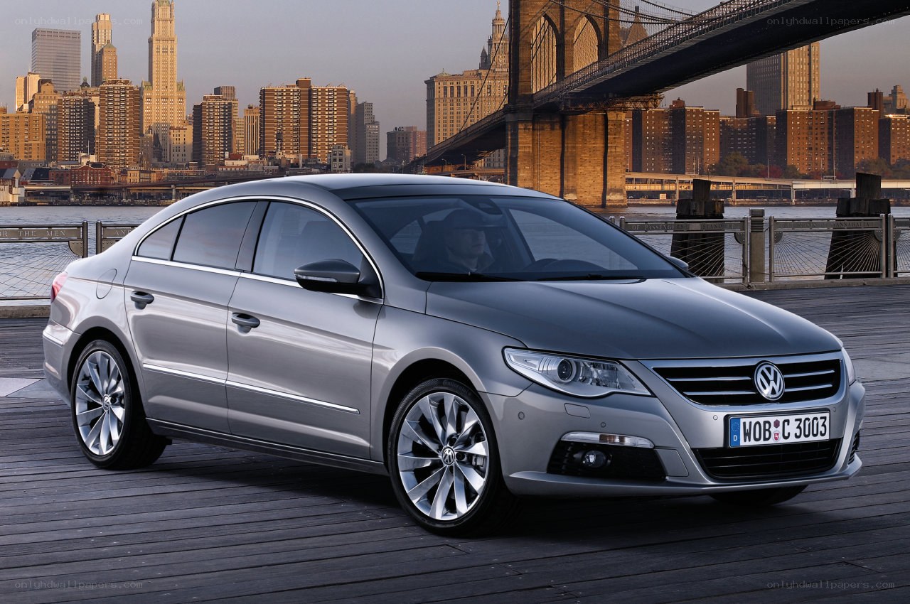 Silver Volkswagen CC by a bridge