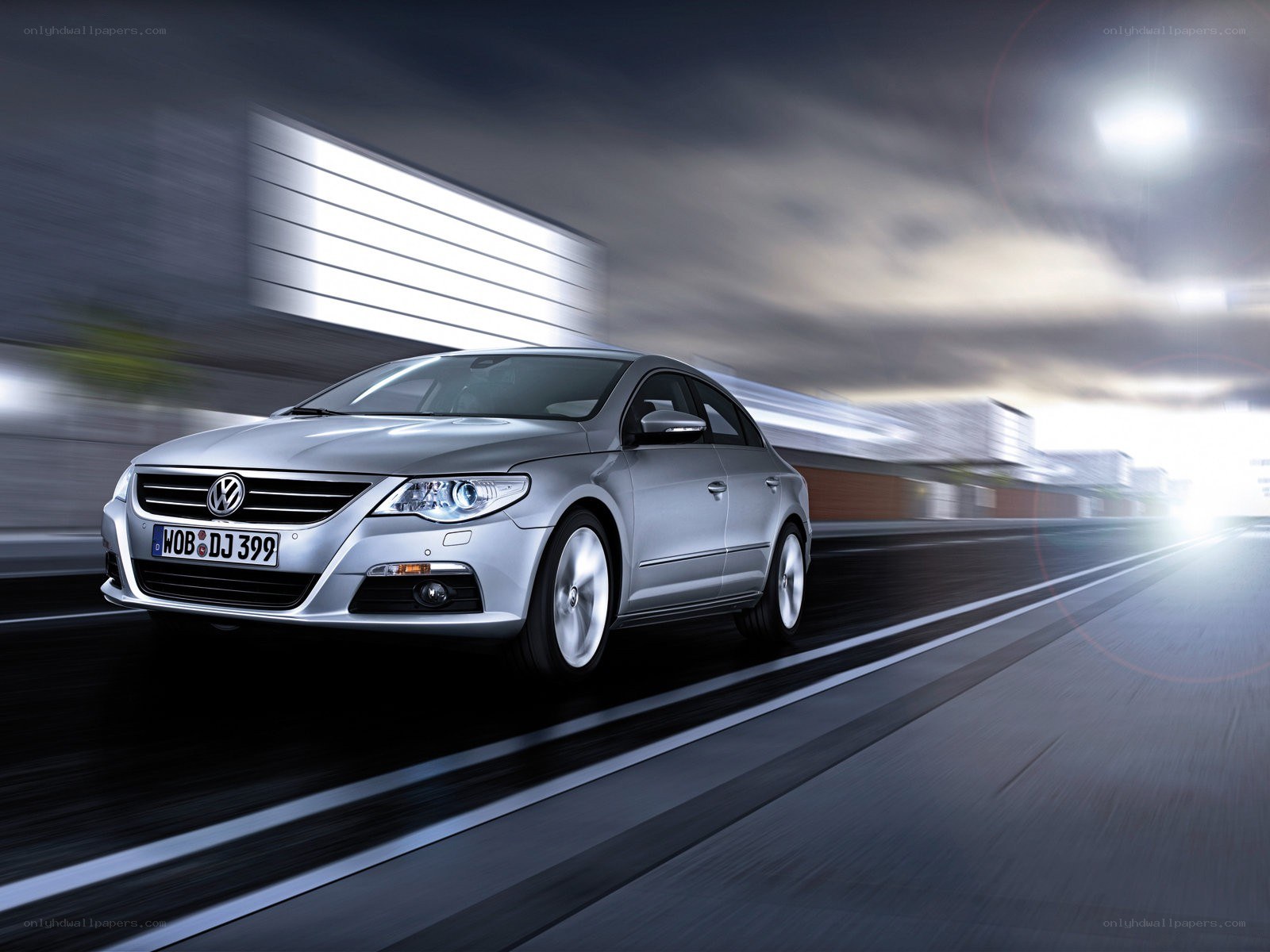 silver volkswagen cc in motion