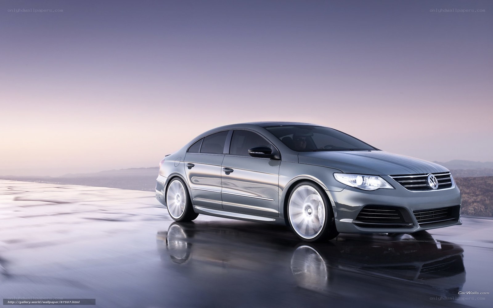 Silver Volkswagen CC on wet road