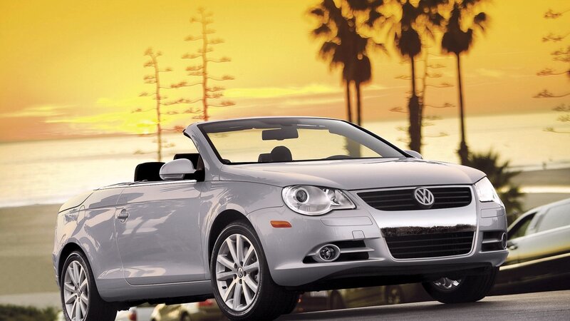 Silver Volkswagen Convertible at Sunset