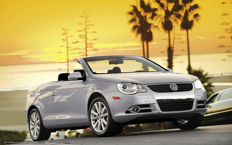 Silver Volkswagen Convertible at Sunset
