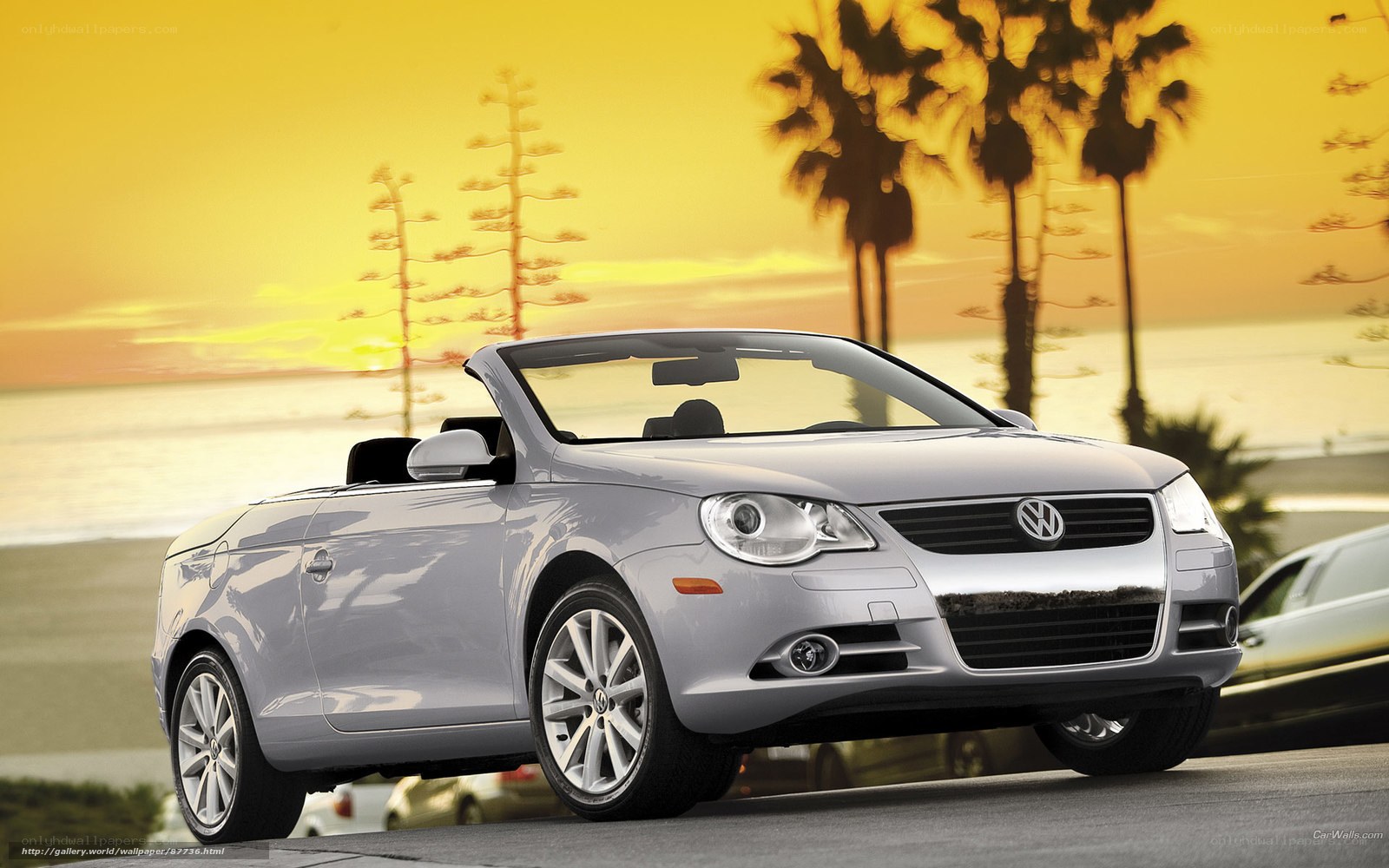 Silver Volkswagen Convertible at Sunset