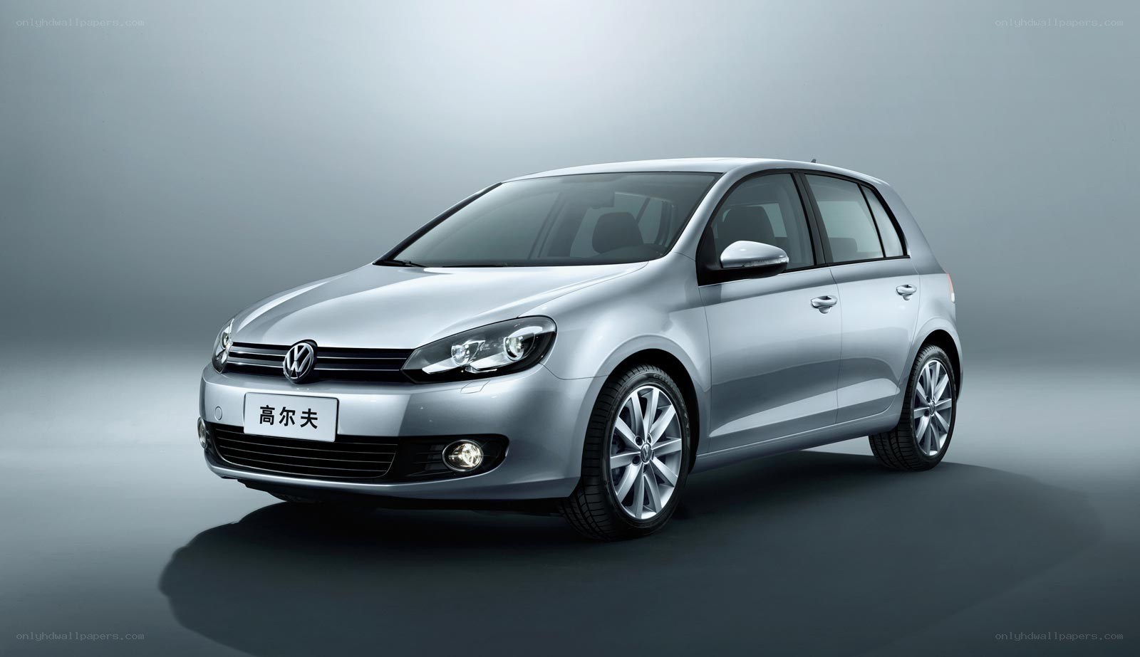 Silver Volkswagen Golf car