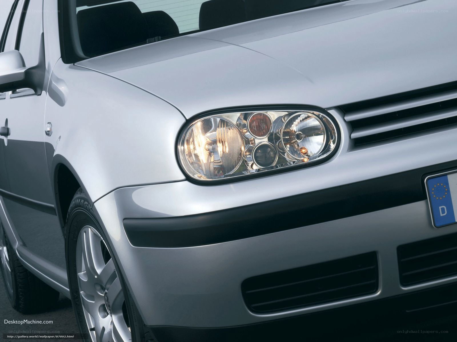 silver volkswagen golf front view