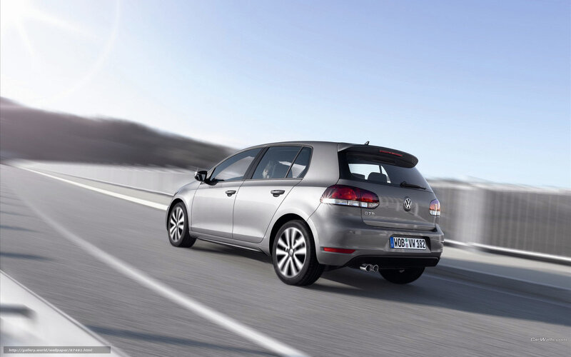 Silver Volkswagen Golf GTD in motion