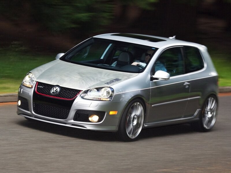 silver volkswagen golf r32 in motion