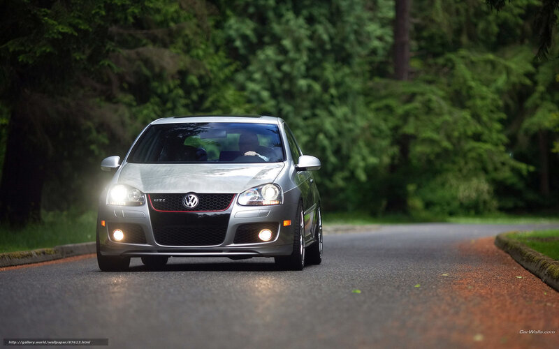 silver volkswagen gti on forest road