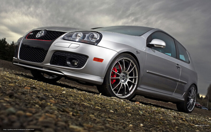 Silver Volkswagen GTI on gravel