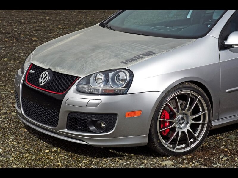 silver volkswagen gtI with carbon fiber hood