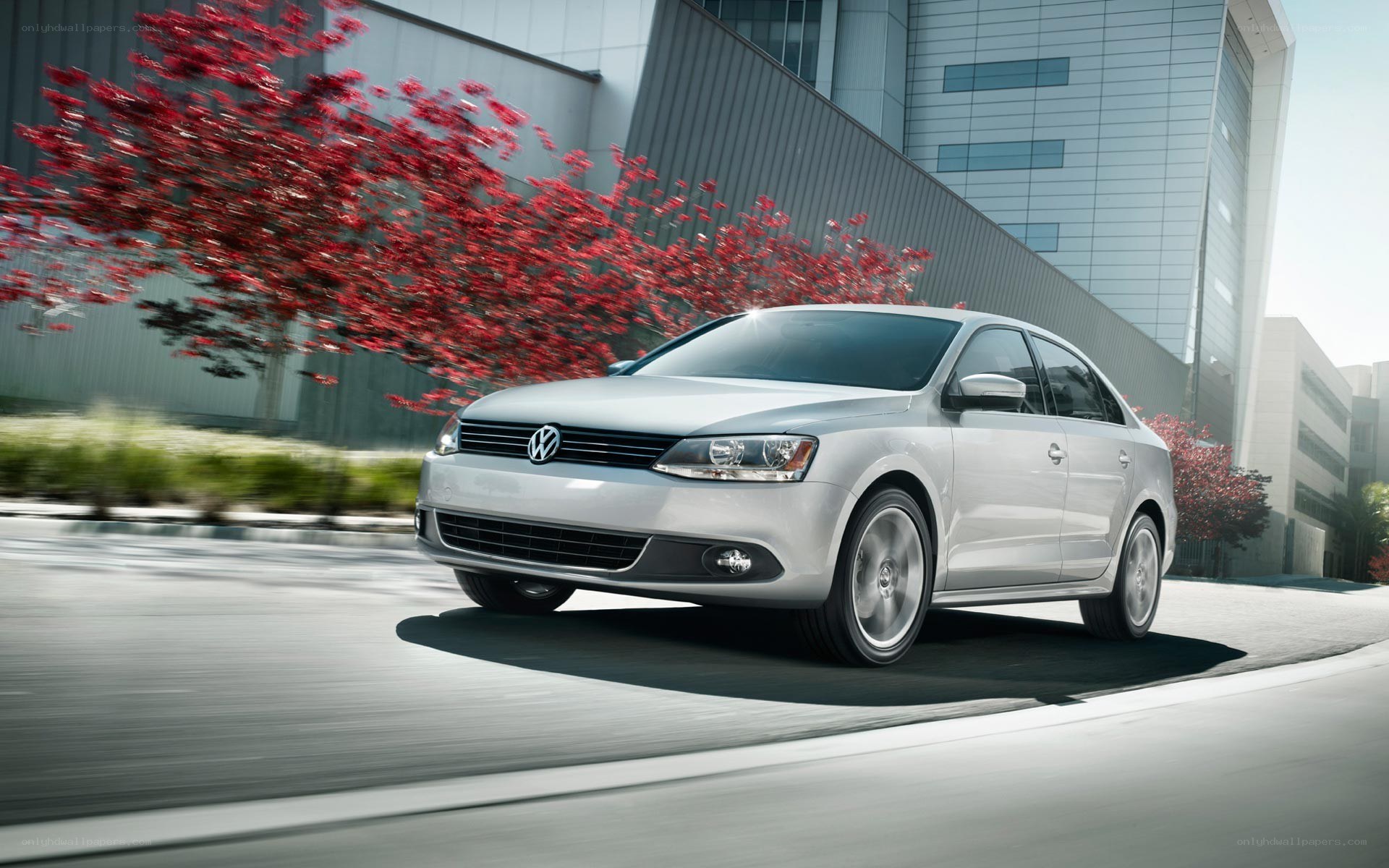 Silver Volkswagen Jetta in motion