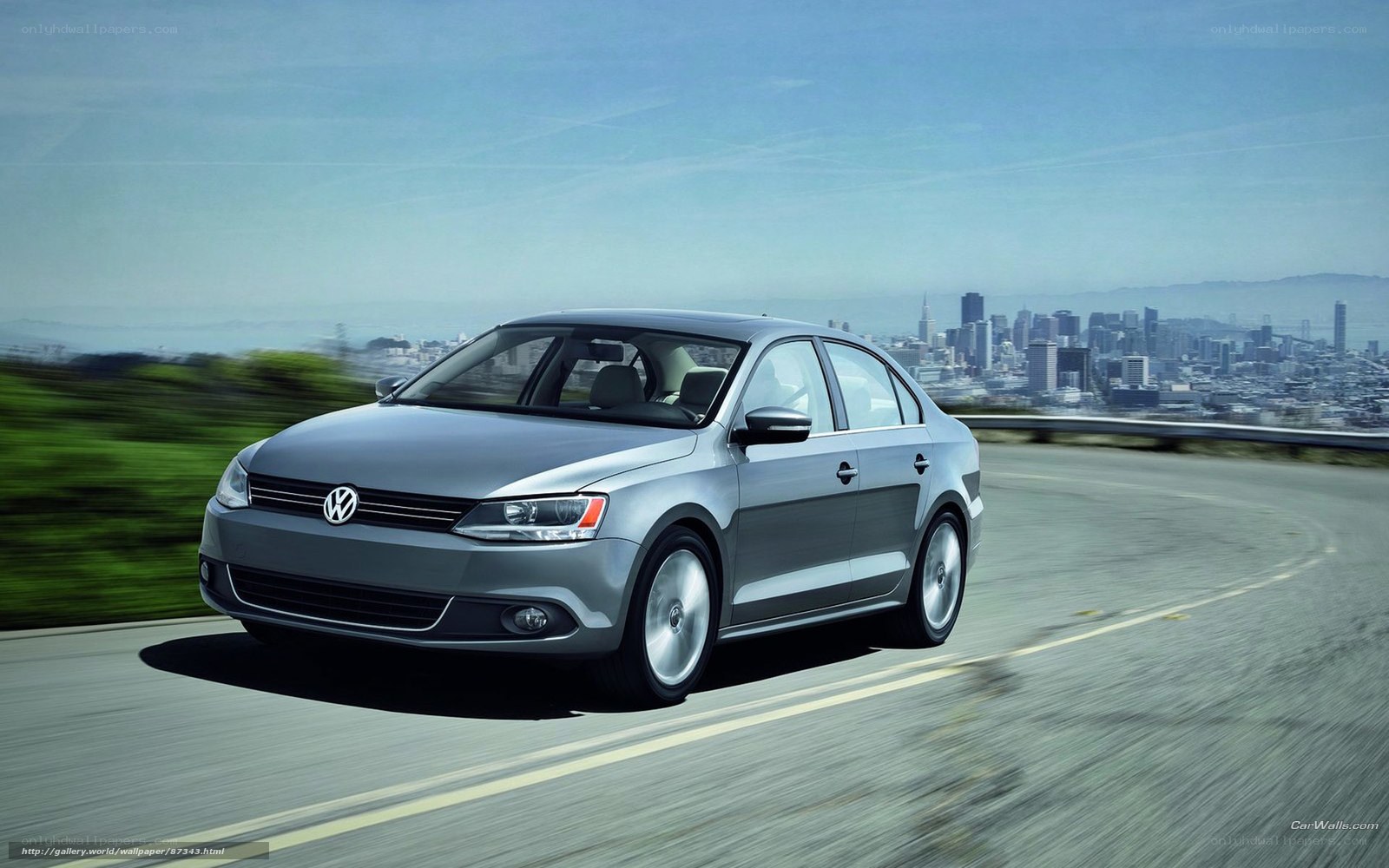 Silver Volkswagen Jetta on a road