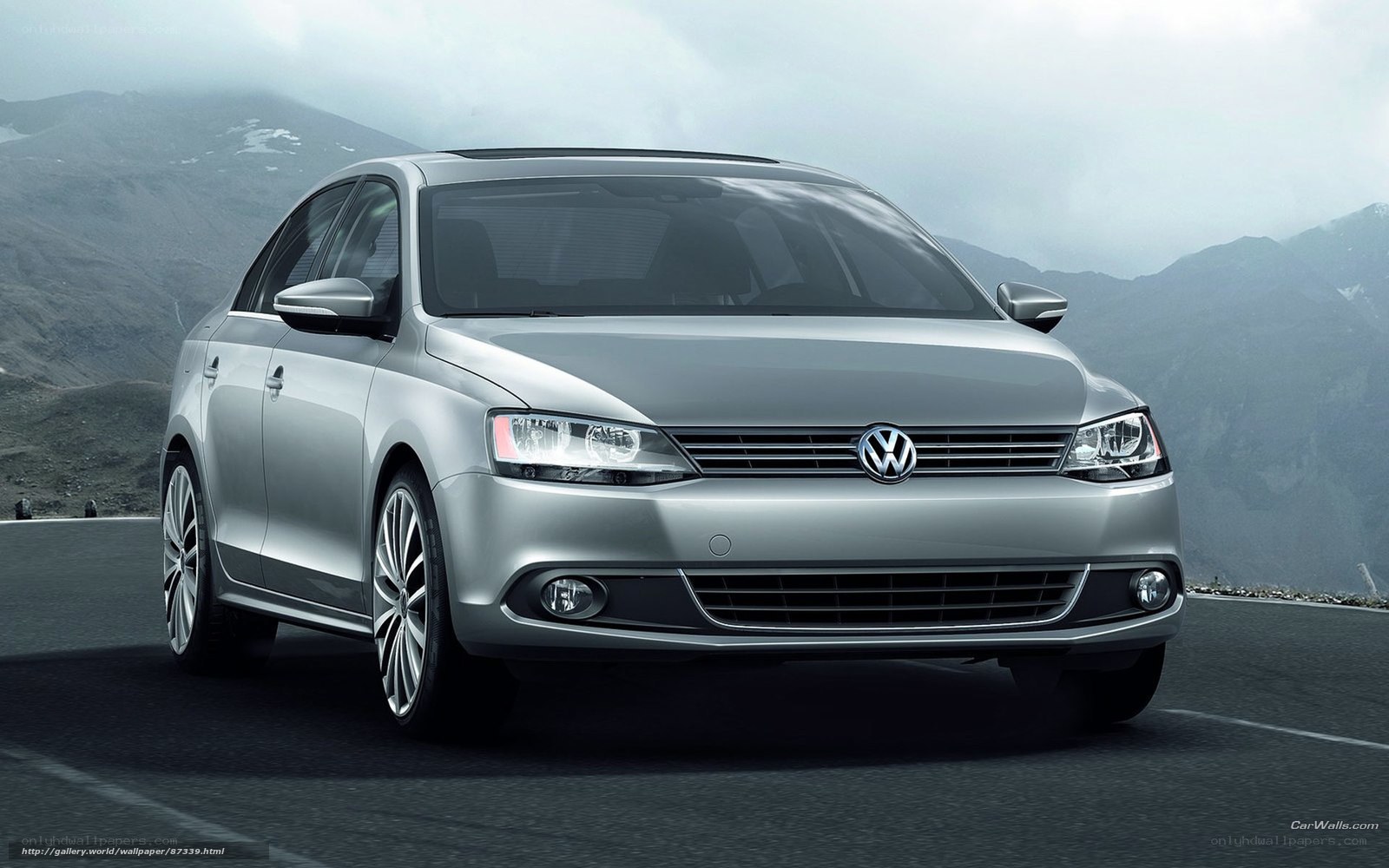 Silver Volkswagen Jetta on mountain road