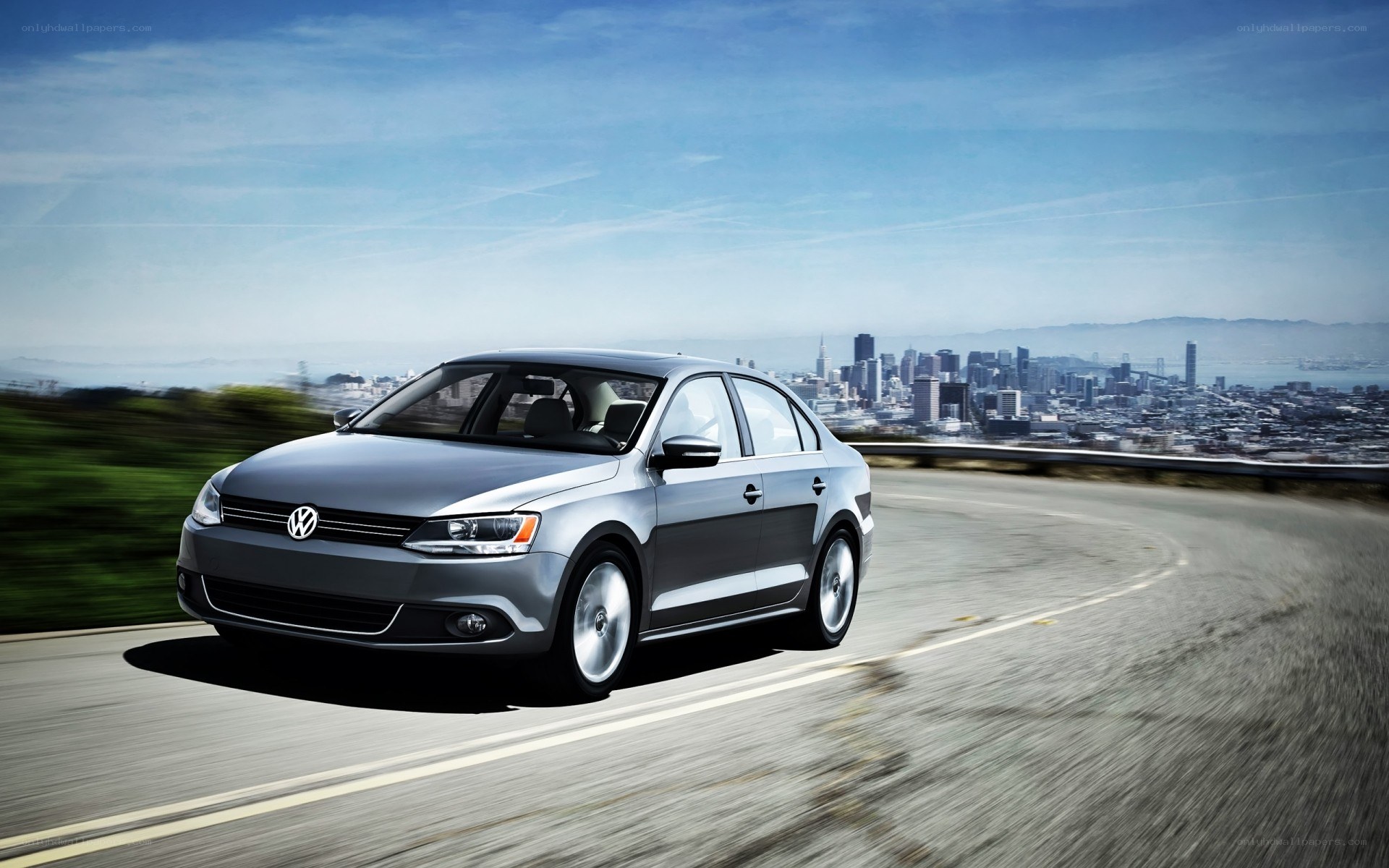 silver volkswagen jetta on road