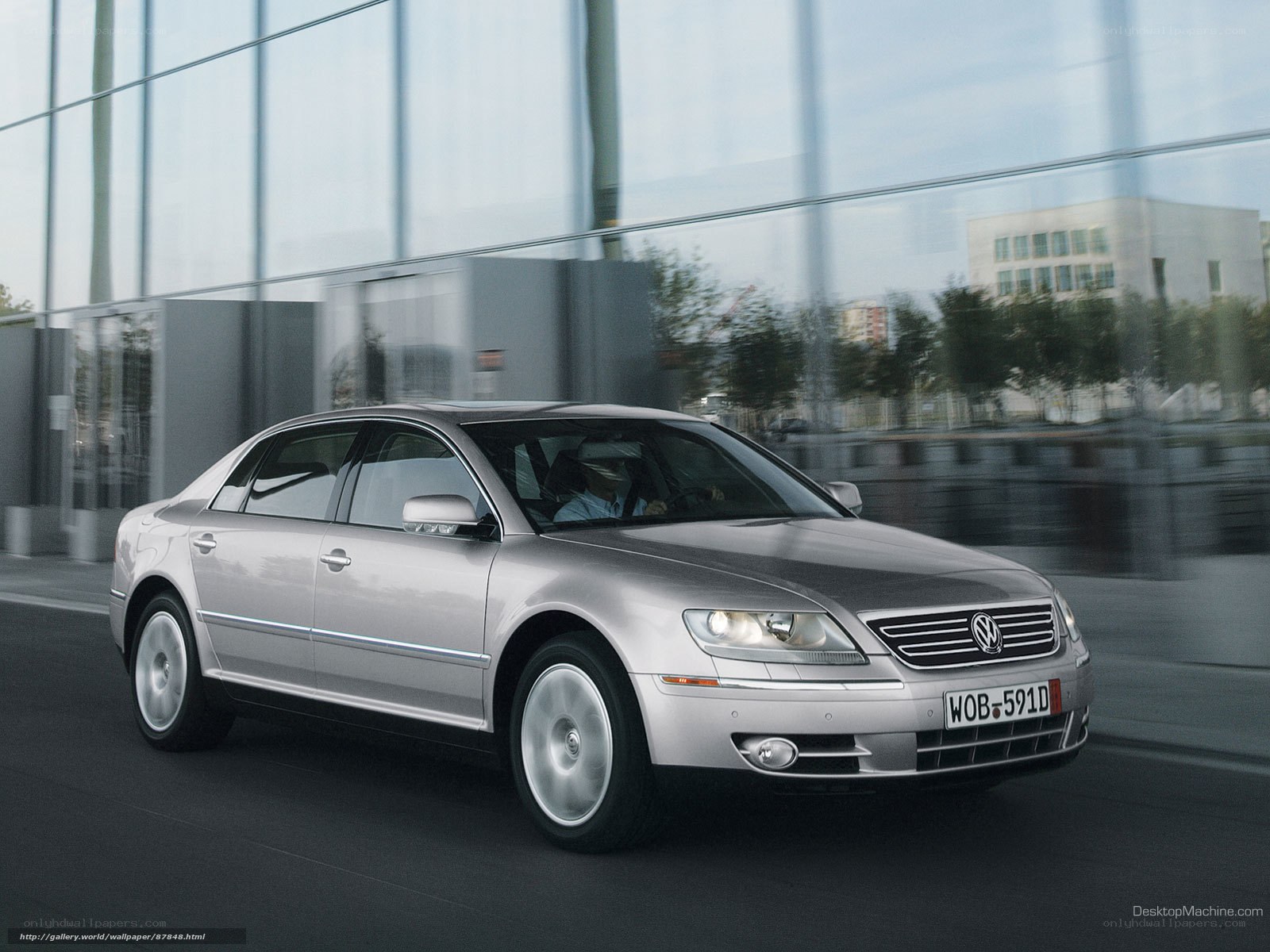silver volkswagen phaeton in motion
