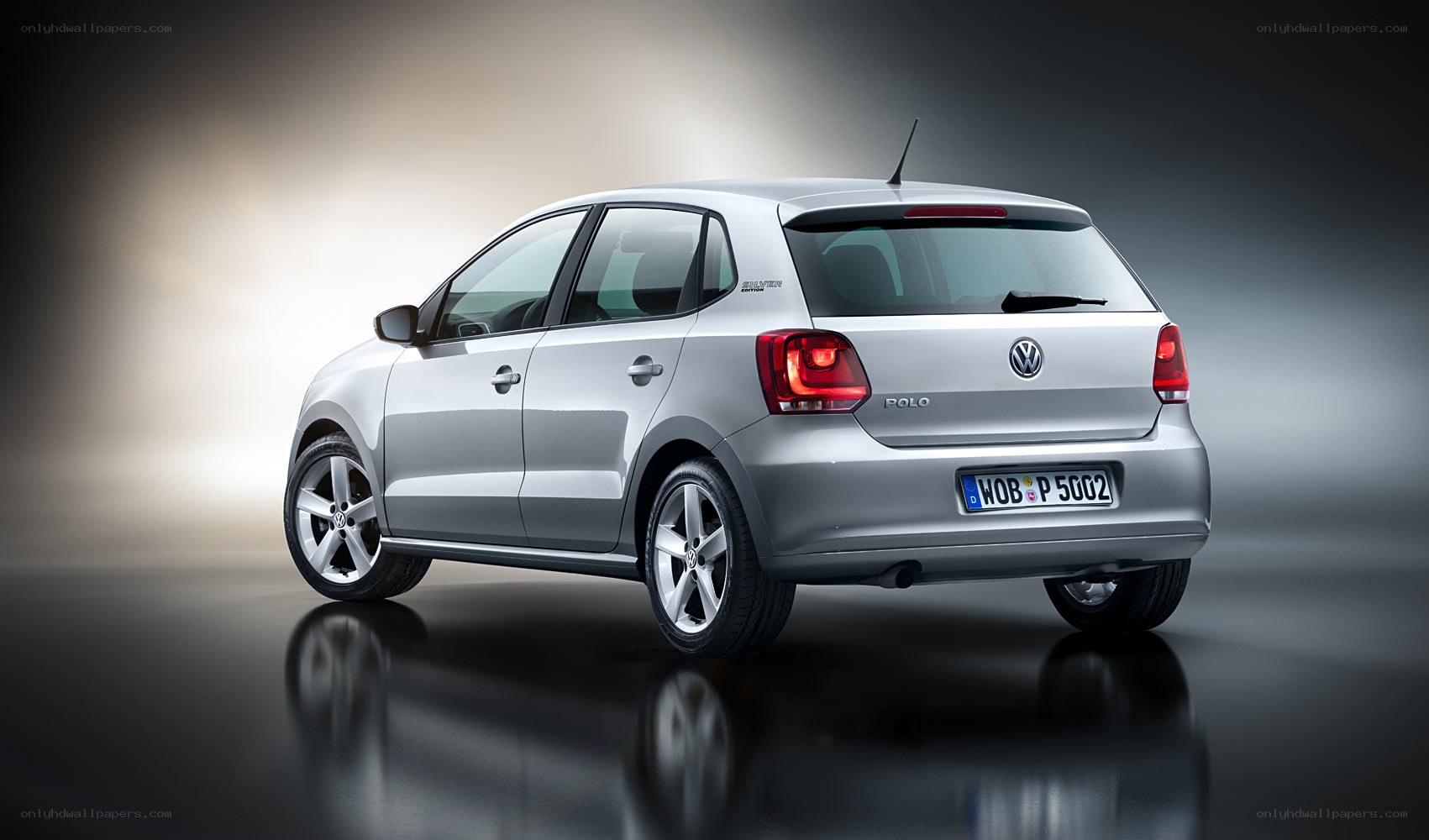 silver volkswagen polo hatchback