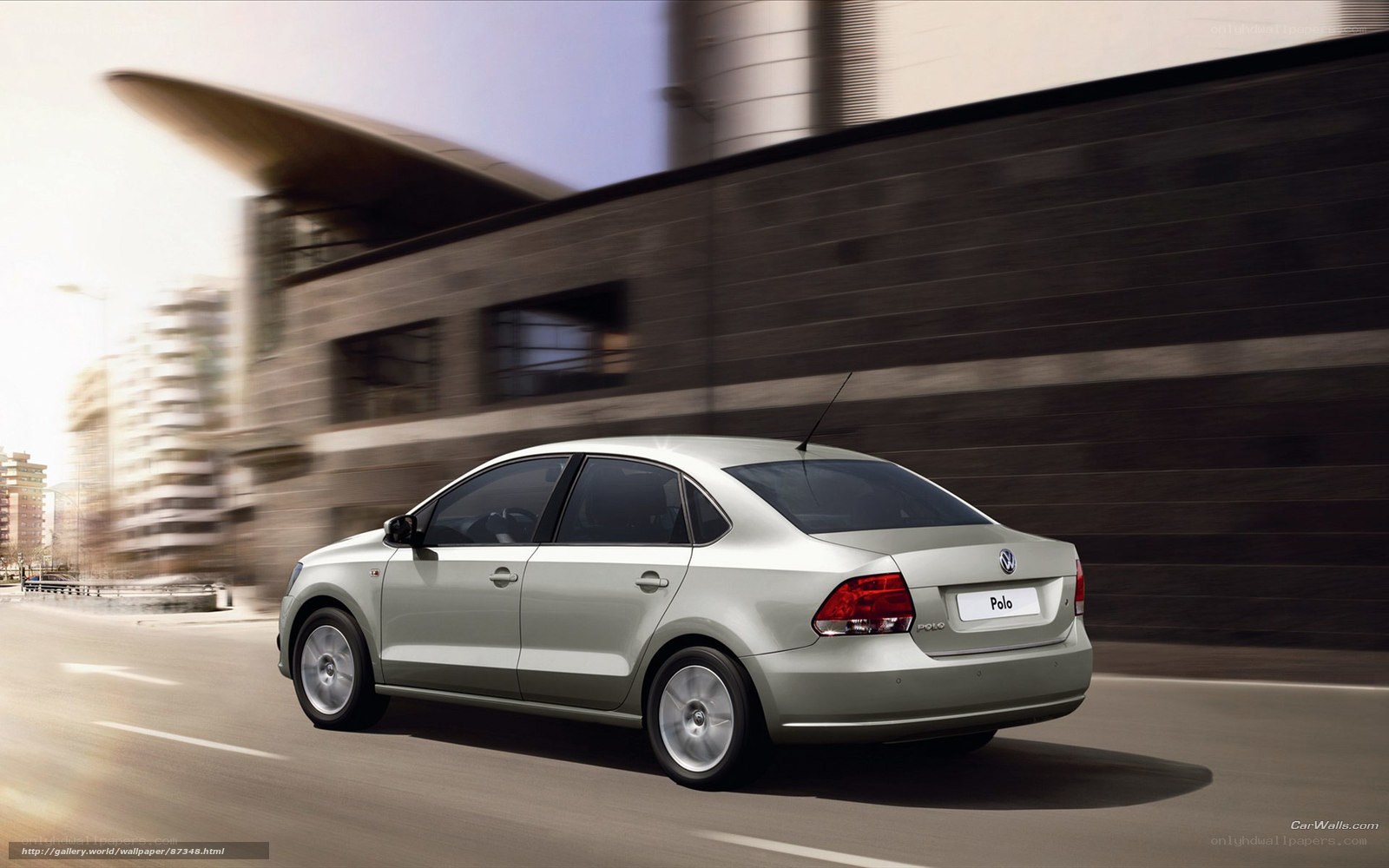 Silver Volkswagen Polo in motion