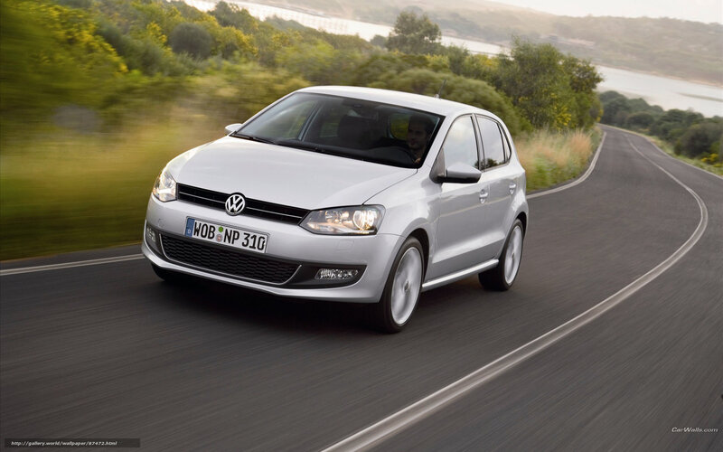 Silver Volkswagen Polo on a winding road