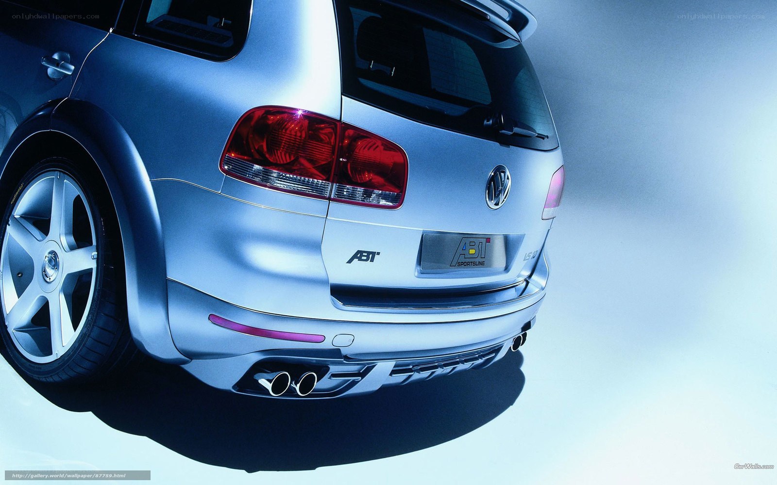 silver volkswagen suv rear view