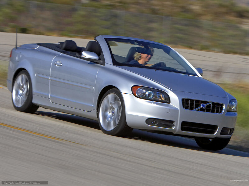 silver volvo convertible driving