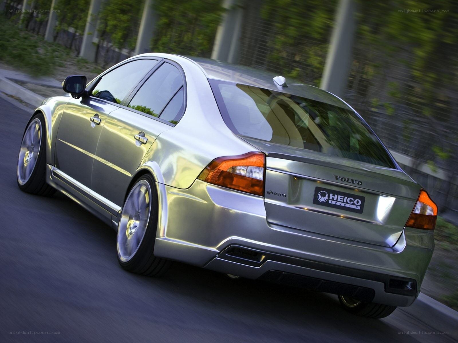 silver volvo in motion