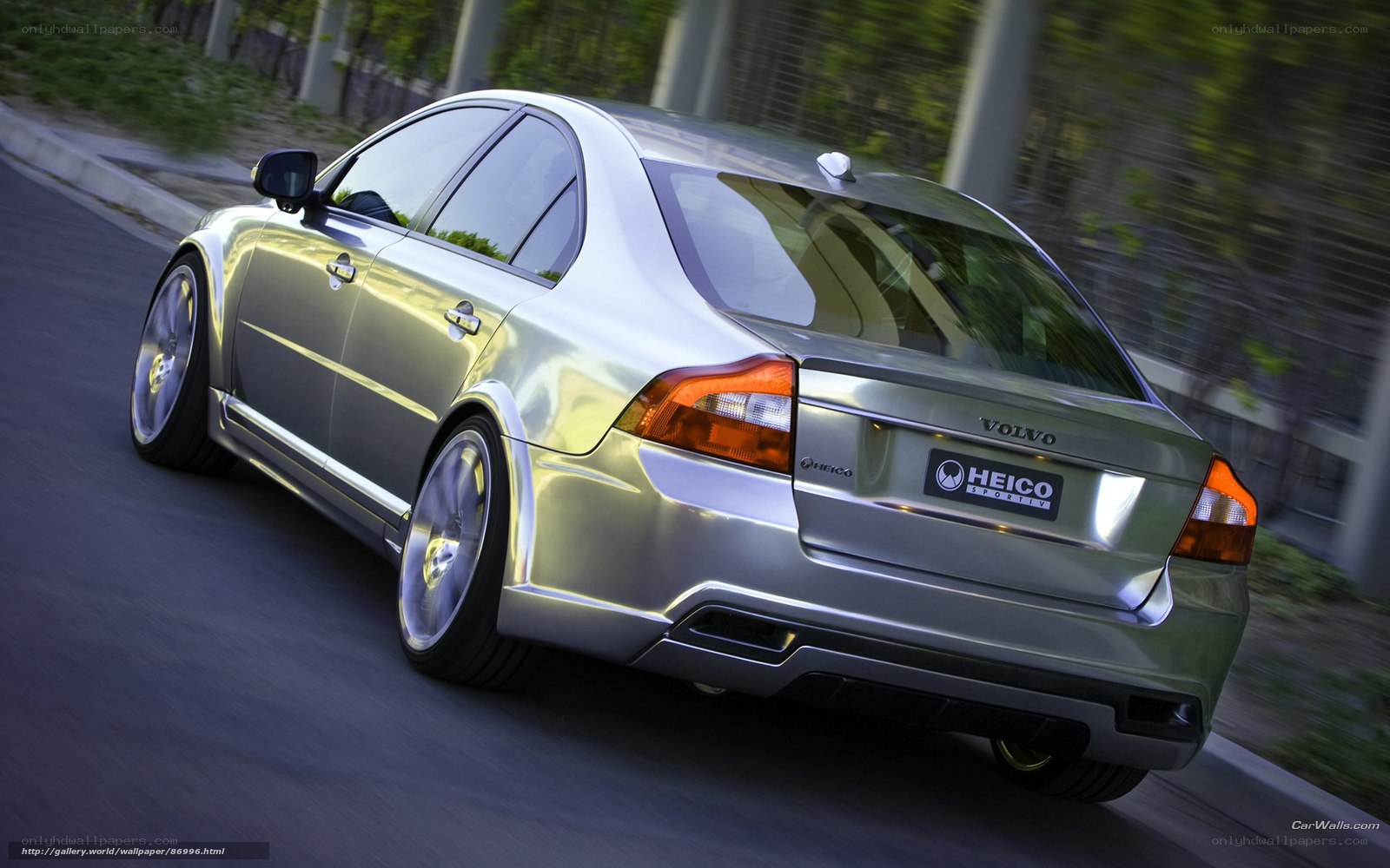 silver volvo in motion