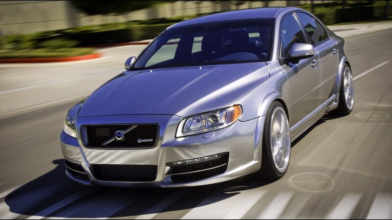 silver volvo in motion