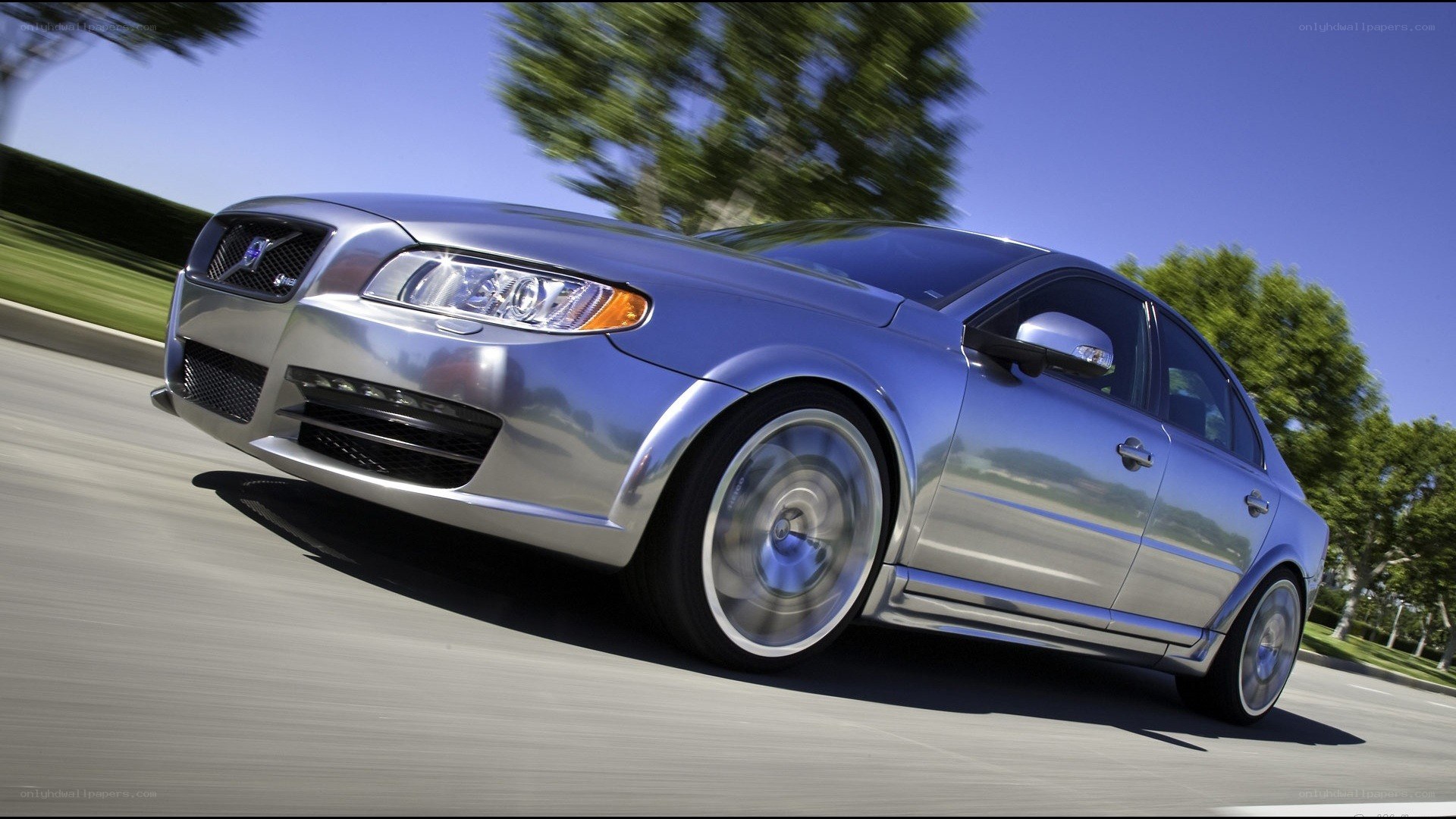 silver volvo in motion