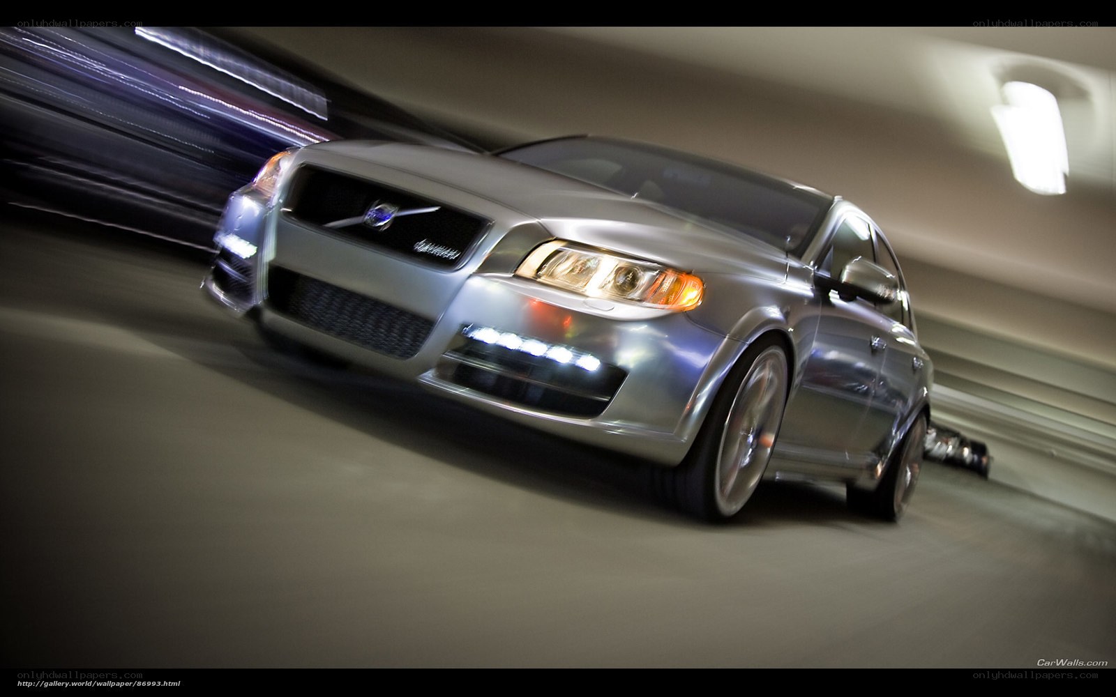Silver Volvo in motion