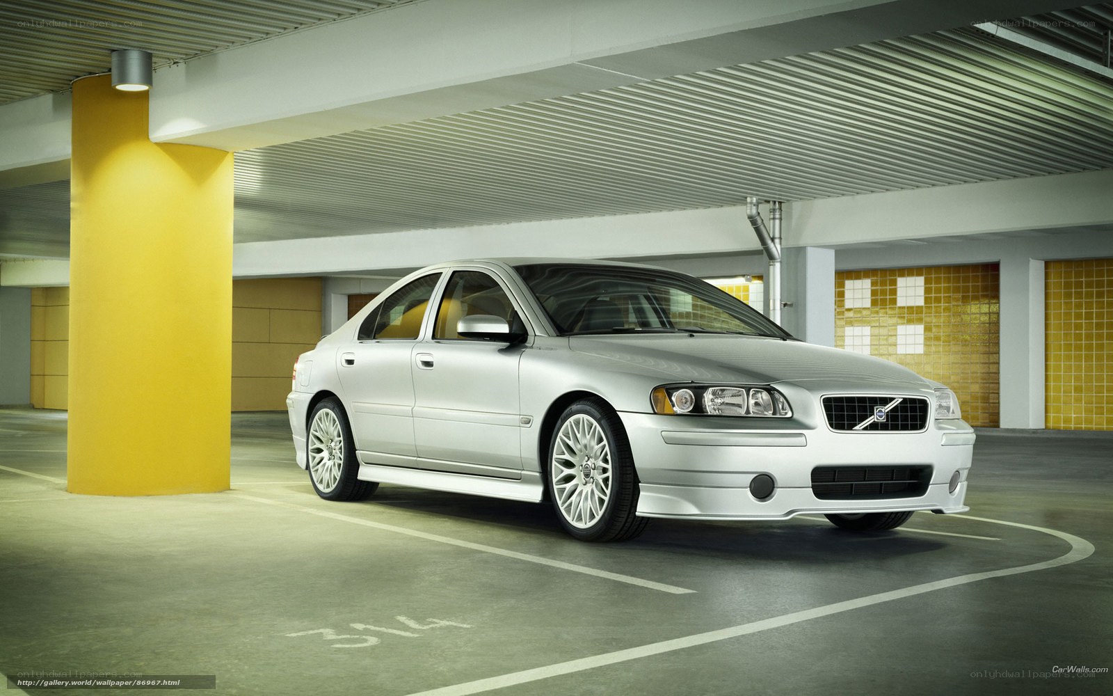 Silver Volvo in parking garage