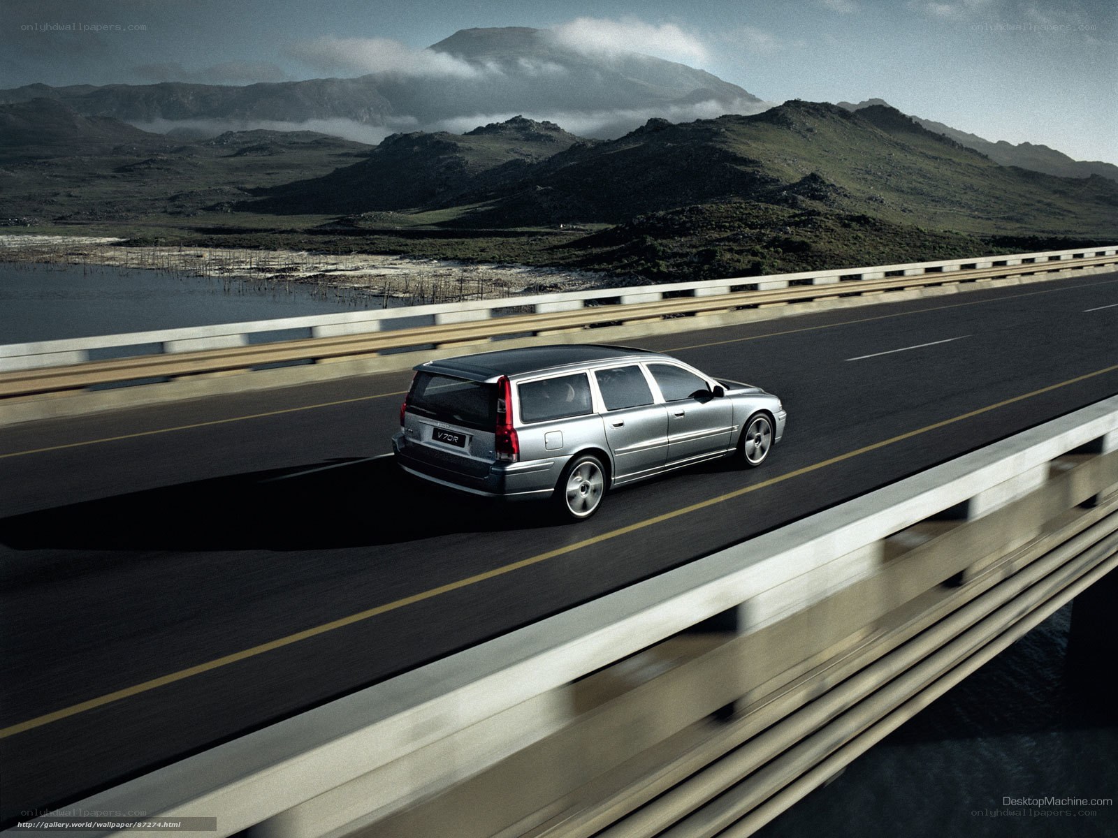 silver volvo on a bridge