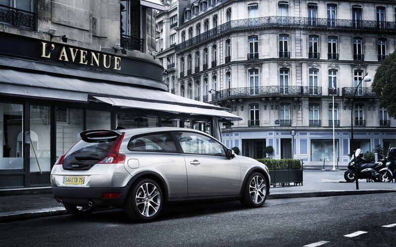 Silver Volvo on a city street