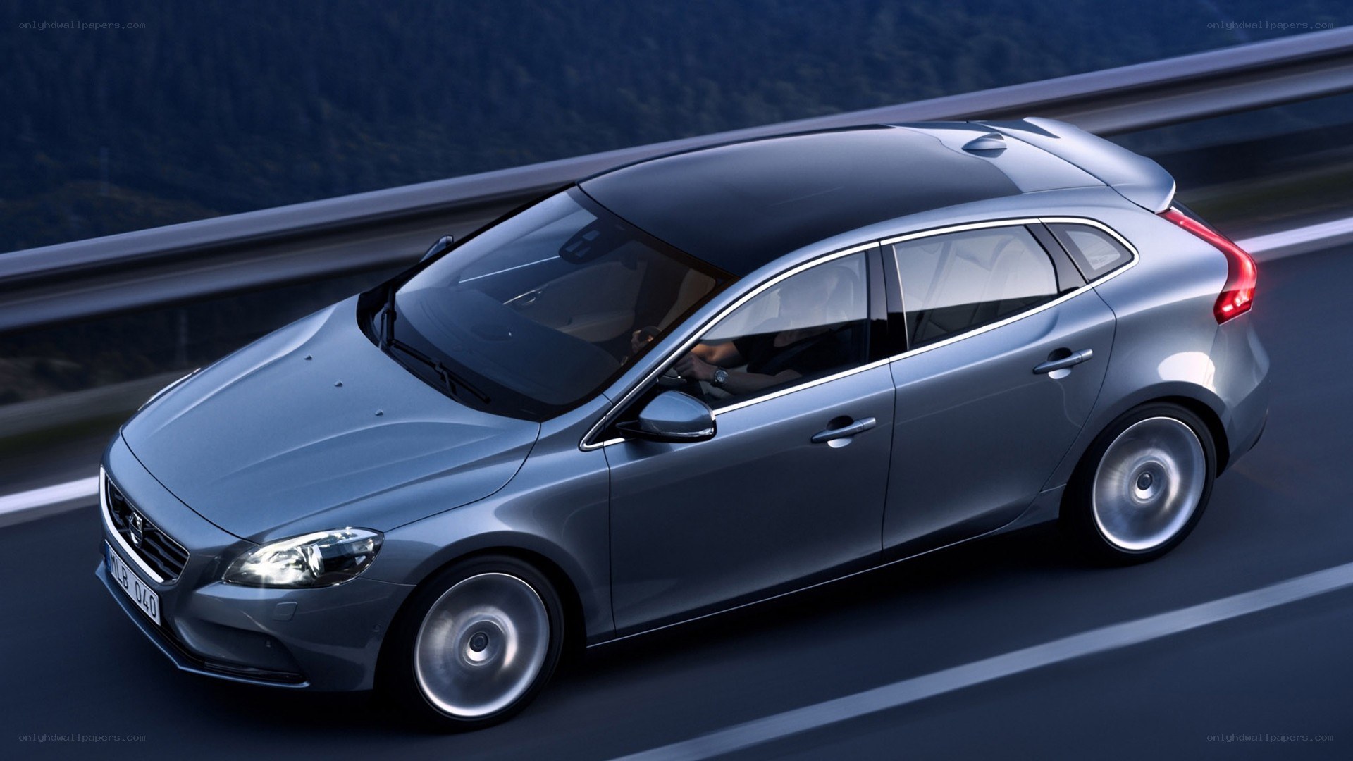 silver volvo on a highway