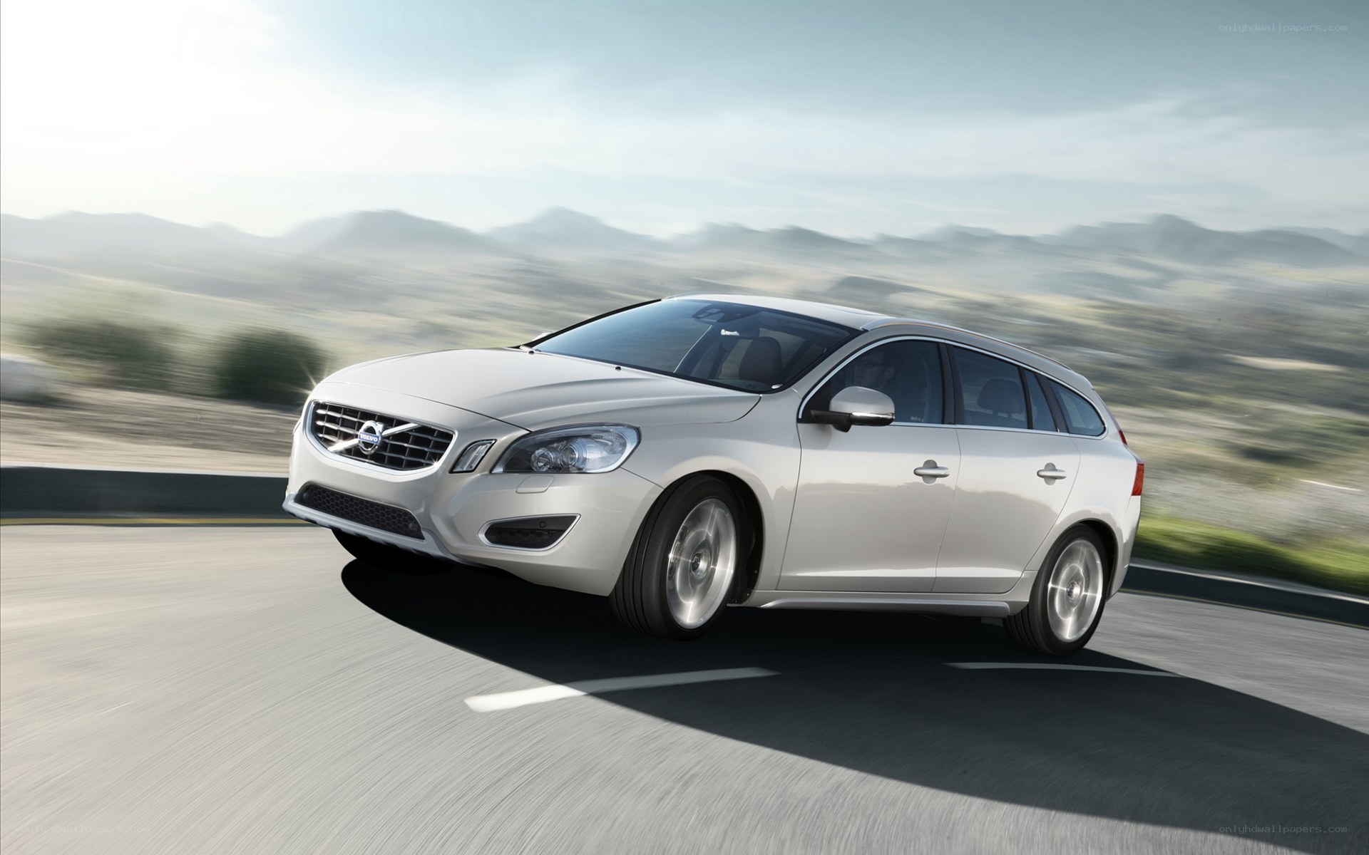 silver volvo on a road